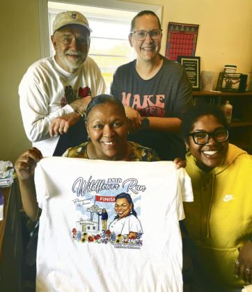 From left, back row, Chip Cooper and Dauma Slapak, Outreach Coordinator. Front row, Toni Godwin, Director Bristow Social Services and Katura Lampkin, Office Assistant
