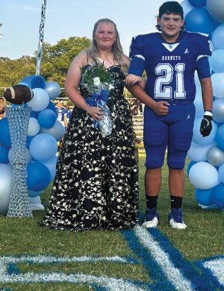 Sophomore Autumn Dyer with escort Malachi McKnight
