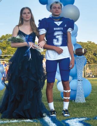 Junior Millie Tietz with escort Wyatt Osburn