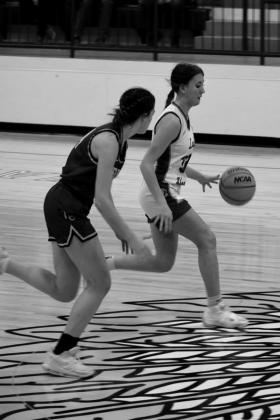 Samantha Peeler dribbles down court. courtesy photo