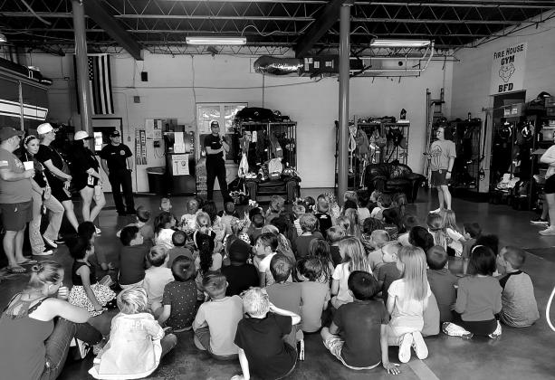 With a quick introduction the firefighters took questions like “Do we hide in the house on fire till our parents find us in ” and more. courtesy photo