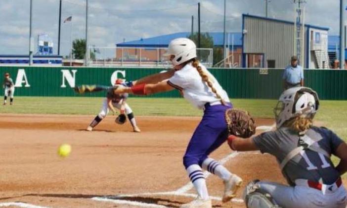 Kinzie Williams drops a bunt against Poteau. courtesy photo