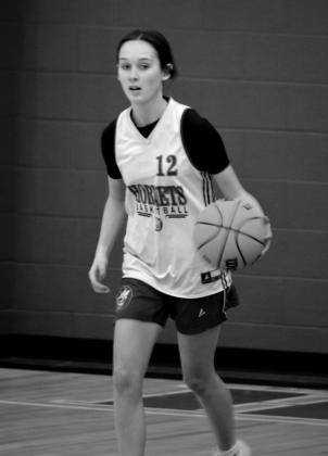 Lauren Carrie makes her move down court.