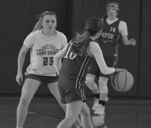 Morgan Steele and Ashley Hall defend the play. courtesy photos