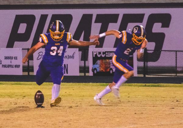 Caleb Ritchie punts the ball as Angus Ponder covers the kick. courtesy photo