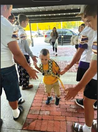 What a great way to start a Friday morning at Edison Elementary with members of the football team and cheer squad greeting all the Little Pirates.