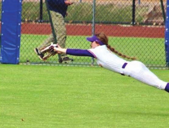 Kinzie Williams with the full layout catch for an out. courtesy photo