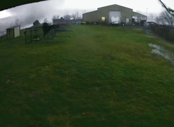 In the left of this photo you can see the tornado as it made its way through the pasture at Barnyard Rescue. courtesy photo