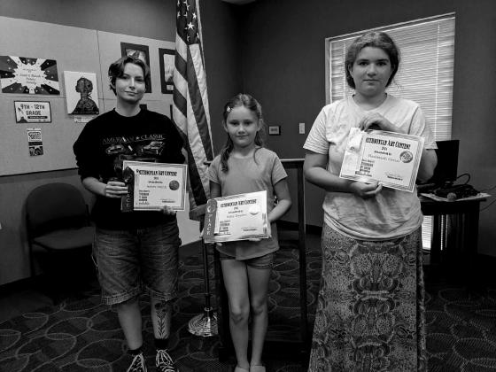 Three winners in attendance at the Art Show Awards, (left to right) High school student, Asher Smith, Middle school students, Riley Braden and Hadassah Greco. courtesy photo