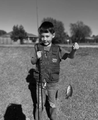 J. Potter enjoys catching bluegill at a private pond courtesy photo