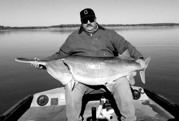 Landon Jones with a paddlefish caught in Keystone Lake on October 19.
