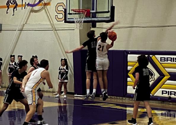 Sloan Dixon guards while Tristin Glisson shoots for the hoop. courtesy photo