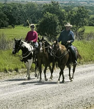 The Spring Wagon Train ride held by the Faith Baptist Church of Slick had 12 wagons and eight to 10 outriders participating each day. The group departed from the church both mornings, traveling approximately 20 miles through the countryside daily. On Friday night, everyone returned to the church to enjoy live music along with a meal of beans and cornbread.