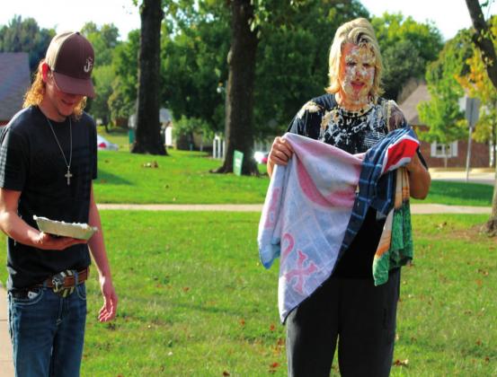 Caleb Jenkins has a smile on his face after the pie was smashed into Chief Raney’s face. Stephanie Summers photo