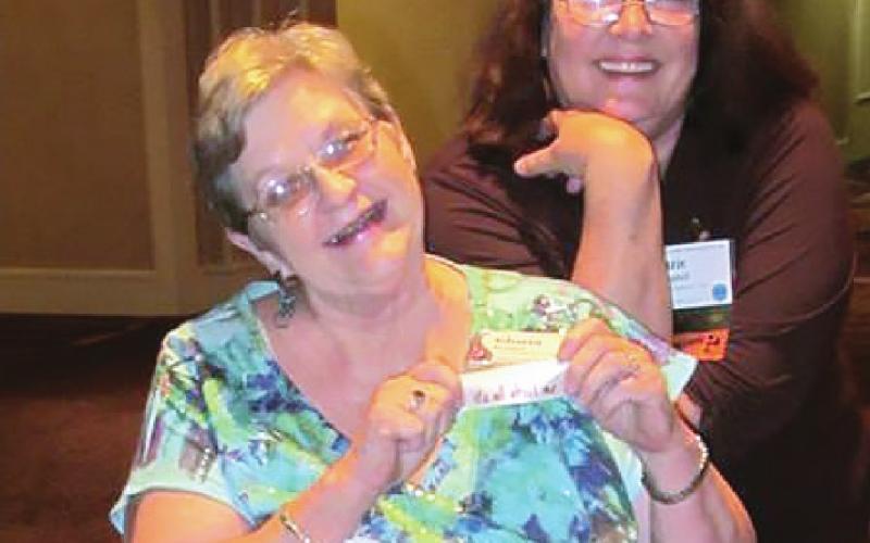 Gloria Trotter and Suzie Campbell pose at the 2015 Oklahoma Press Association Conference held at the Sheraton Hotel in Oklahoma City.