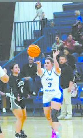 Audrie Bennett passes the ball.