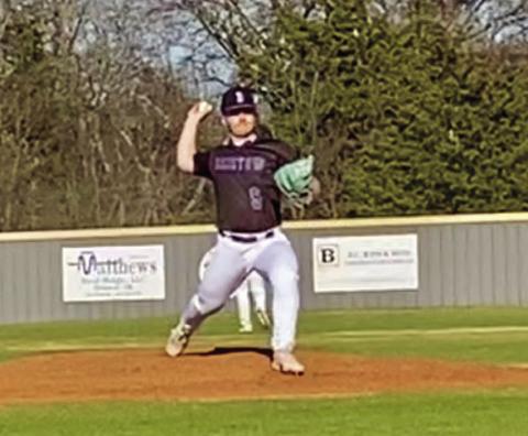 Tanner Aston on mound for the win.