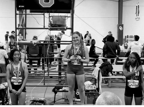 Mashayla Bradford, left, state runner up in 200m at Oklahoma Indoor Championship. courtesy photo