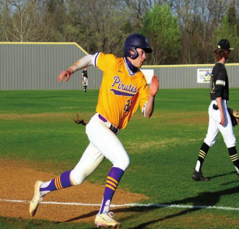 Angus Ponder rounds 3rd base at full speed. Rebecca Langston photo