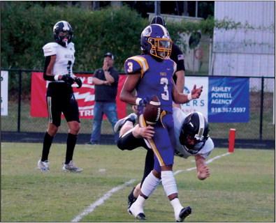 Charles Ware gets chopped block as he makes it into the ends zone.