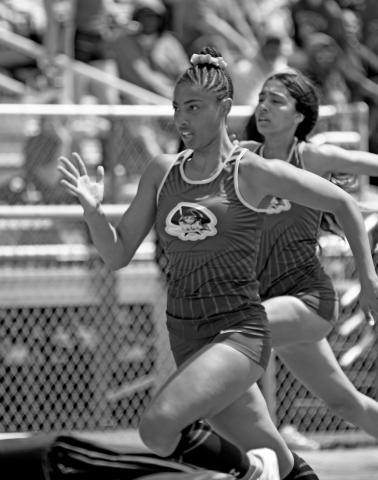 Makynzi Spencer-Friday runs the track.