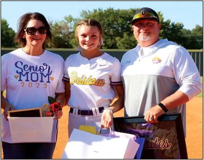 Kinzie Williams with parents Angela and Jason Williams.