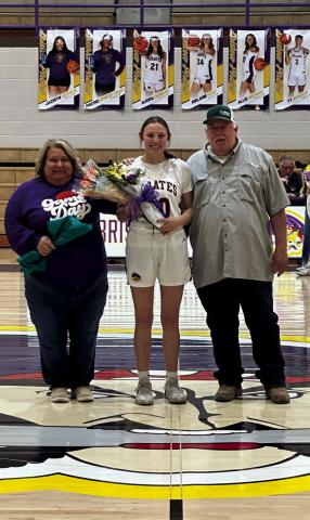 Allie Brewer with parents Brad and Tina Brewer (basketball and cheer).