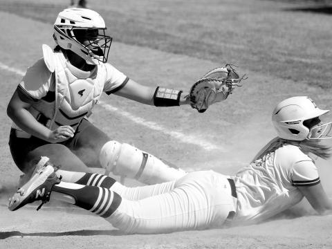Bristow runner out at home plate.