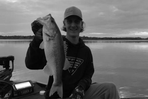Nicholas Fiebrich with a bass caught at Lake Stanley Draper