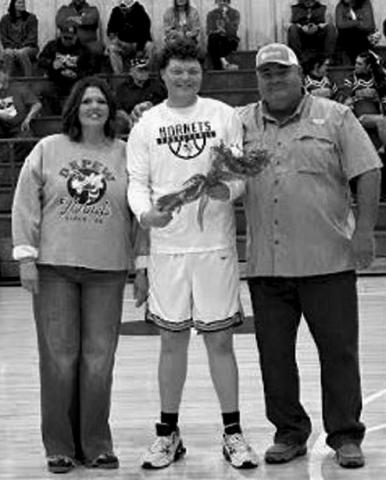 CaleMcKenziewithparentsSusanandAdamMcKenzie. courtesy photo