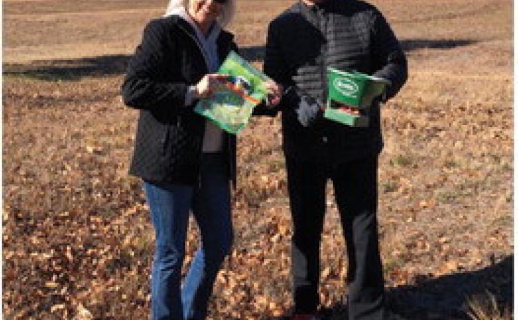 Claudia Dial and Harold Nobles, along with Matt Smith, Connor and Carole Ellis casts Oklahoma Native Wildflower seeds this past weekend. This is the Bristow RotaryClub's second year to enrich the Native Wildflowers so they grow beautifully for the Bristow Wildflower Run &amp; Tabouli Festival in May. courtesy photo